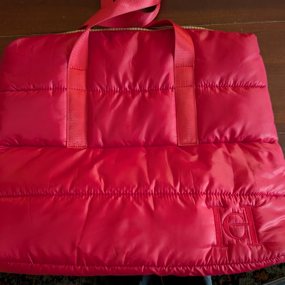 Carolina Herrera Red Fabric with Gold Lettering